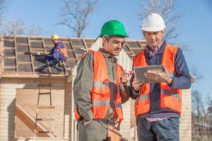 Two worker talk to each other