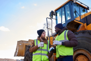 Two worker talk to each other