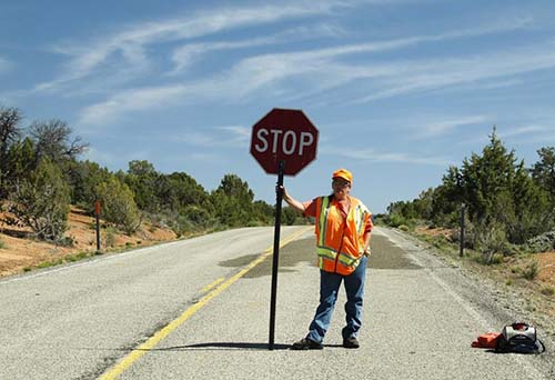 Ladie stand on the road